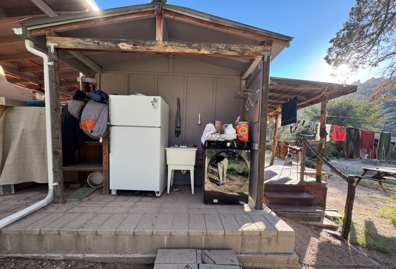 Laundry facilities shack at Dharma Treasure
